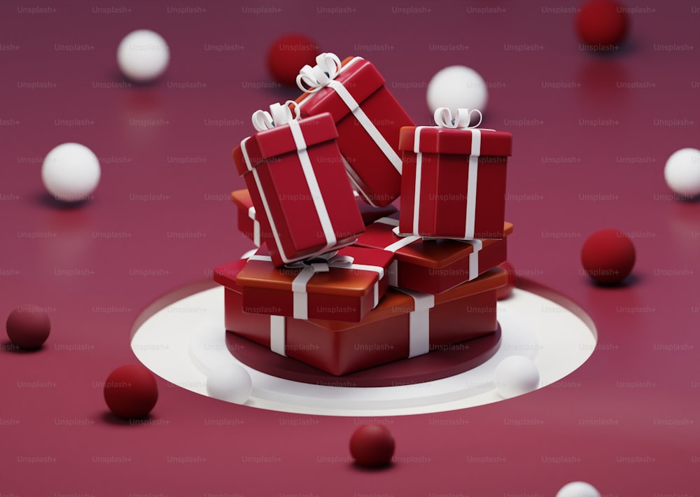 a pile of red presents sitting on top of a white plate