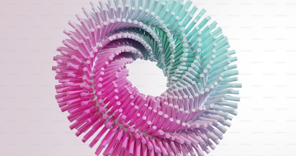 un objet circulaire fait de brosses à dents sur fond blanc