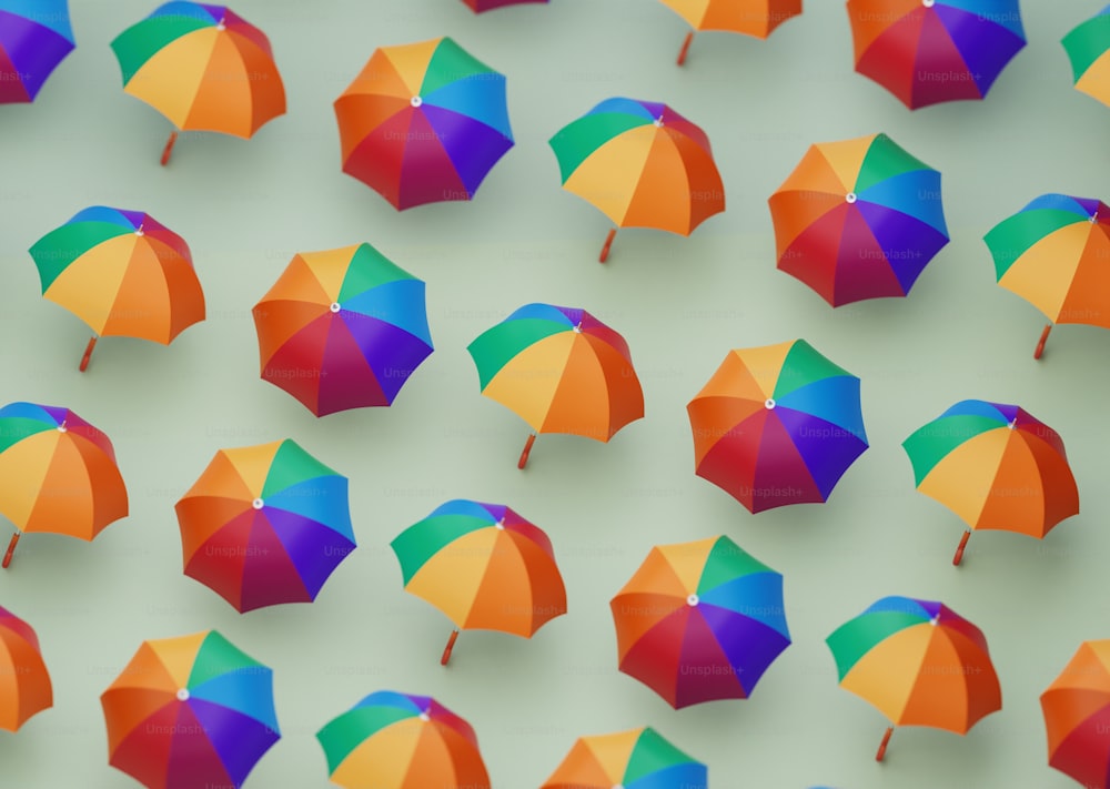 Eine Gruppe von bunten Regenschirmen an einer Wand