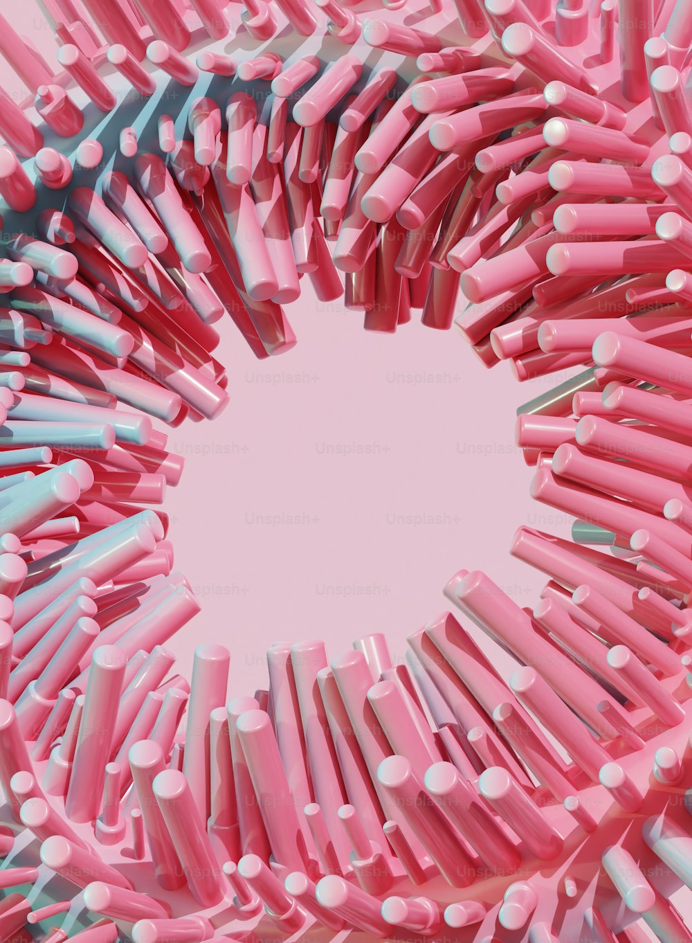 a circle of pink and blue toothbrushes