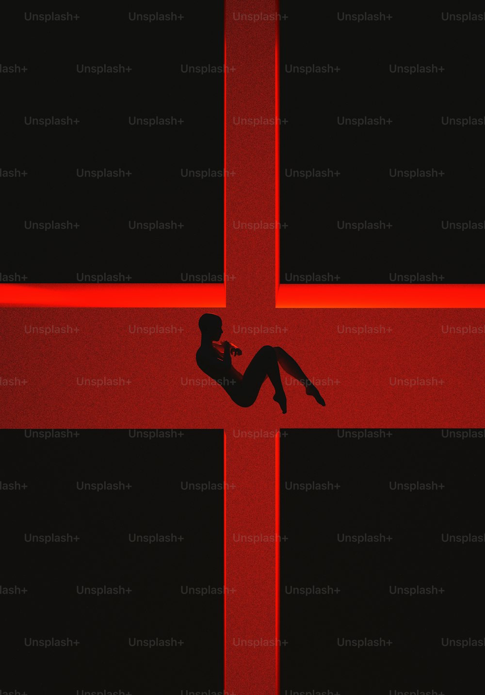 una silueta de una persona acostada en una cruz