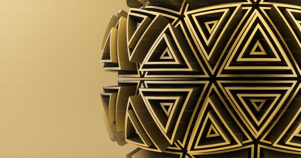a golden object with a geometric design on it