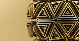 a golden object with a geometric design on it