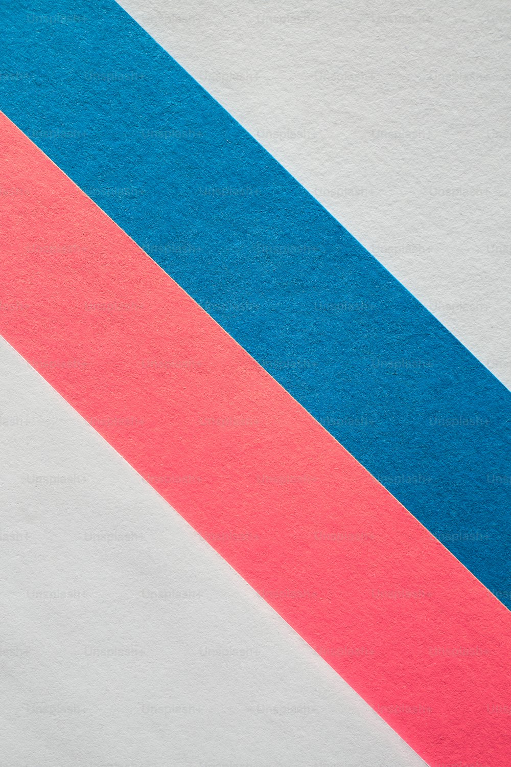 a red, white, and blue strip of paper