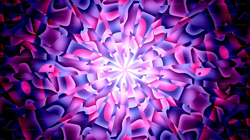 an abstract image of a pink and purple flower