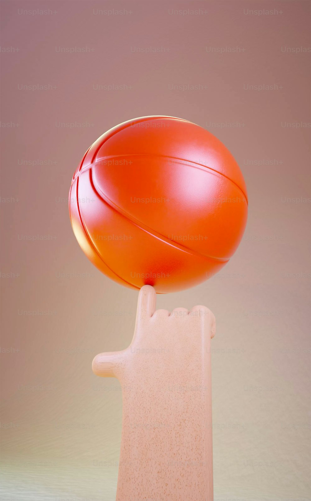 a red ball sitting on top of a pink object