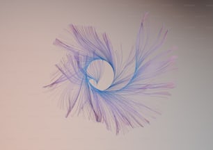 a blue and purple object is flying in the air