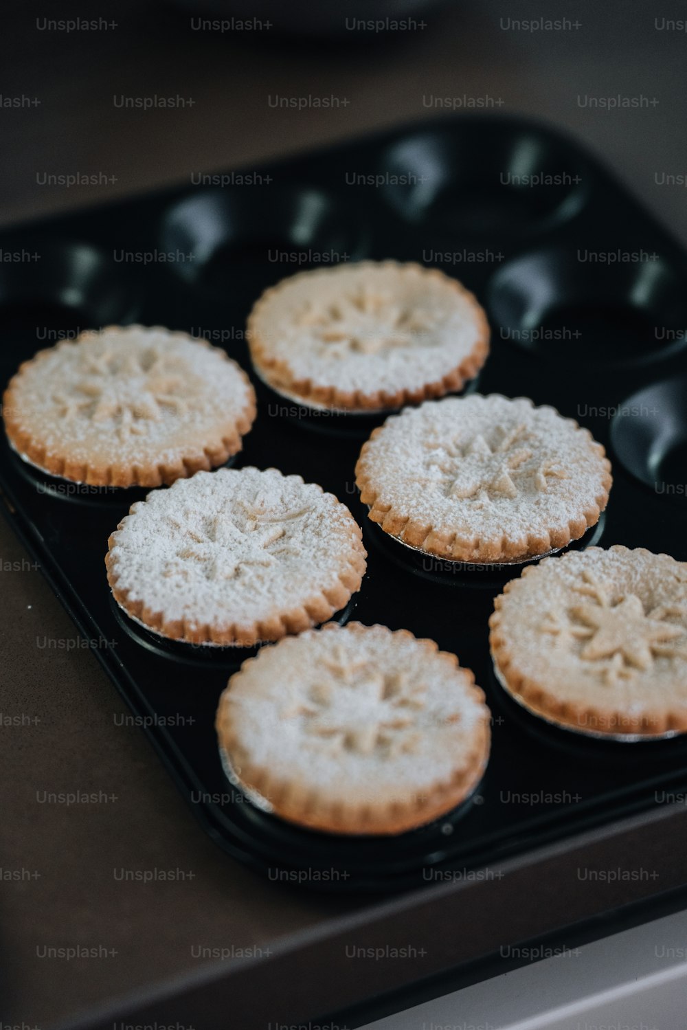 a close up of a tray of food on a stove