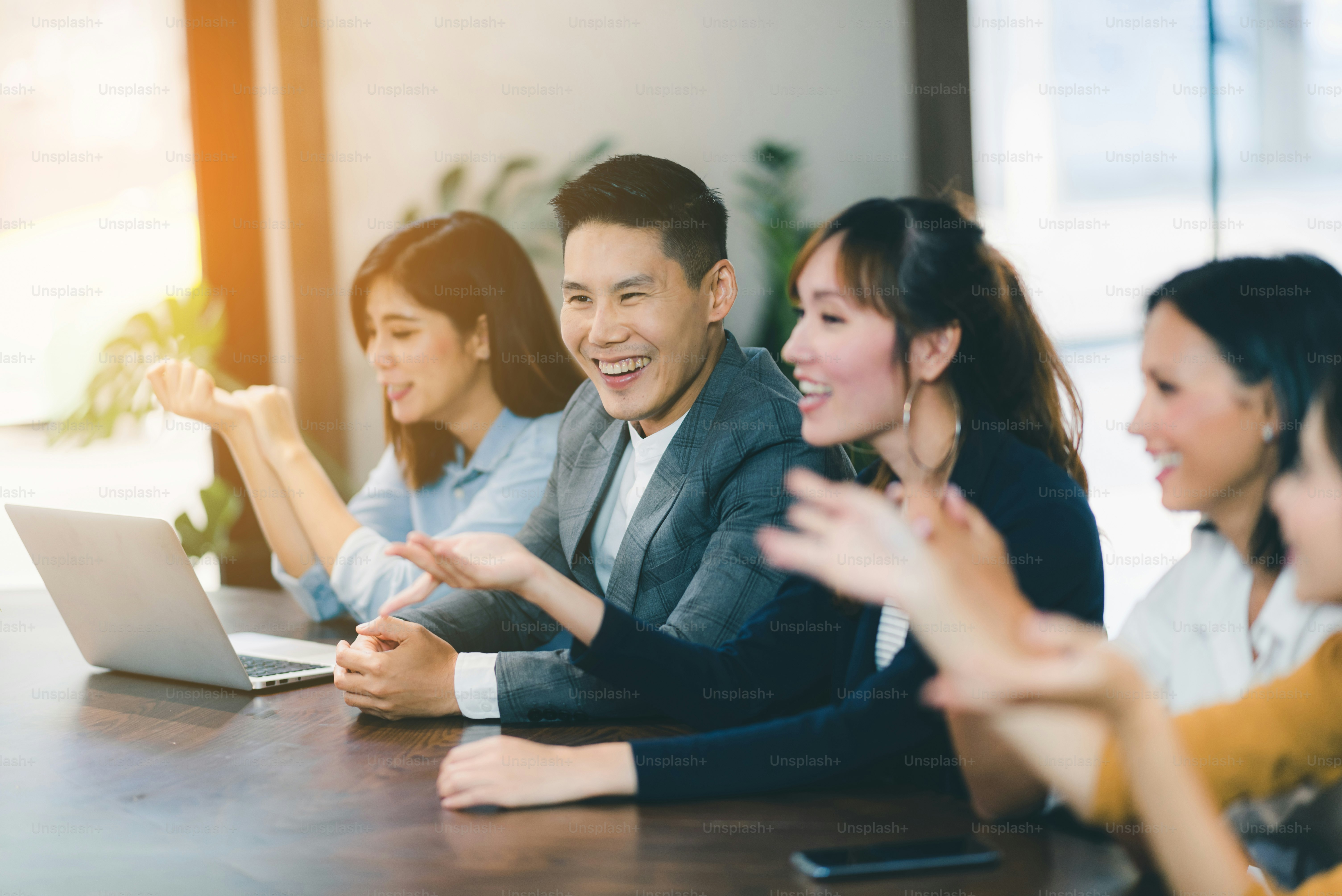 Successful business group of people at work in co-working space office ...