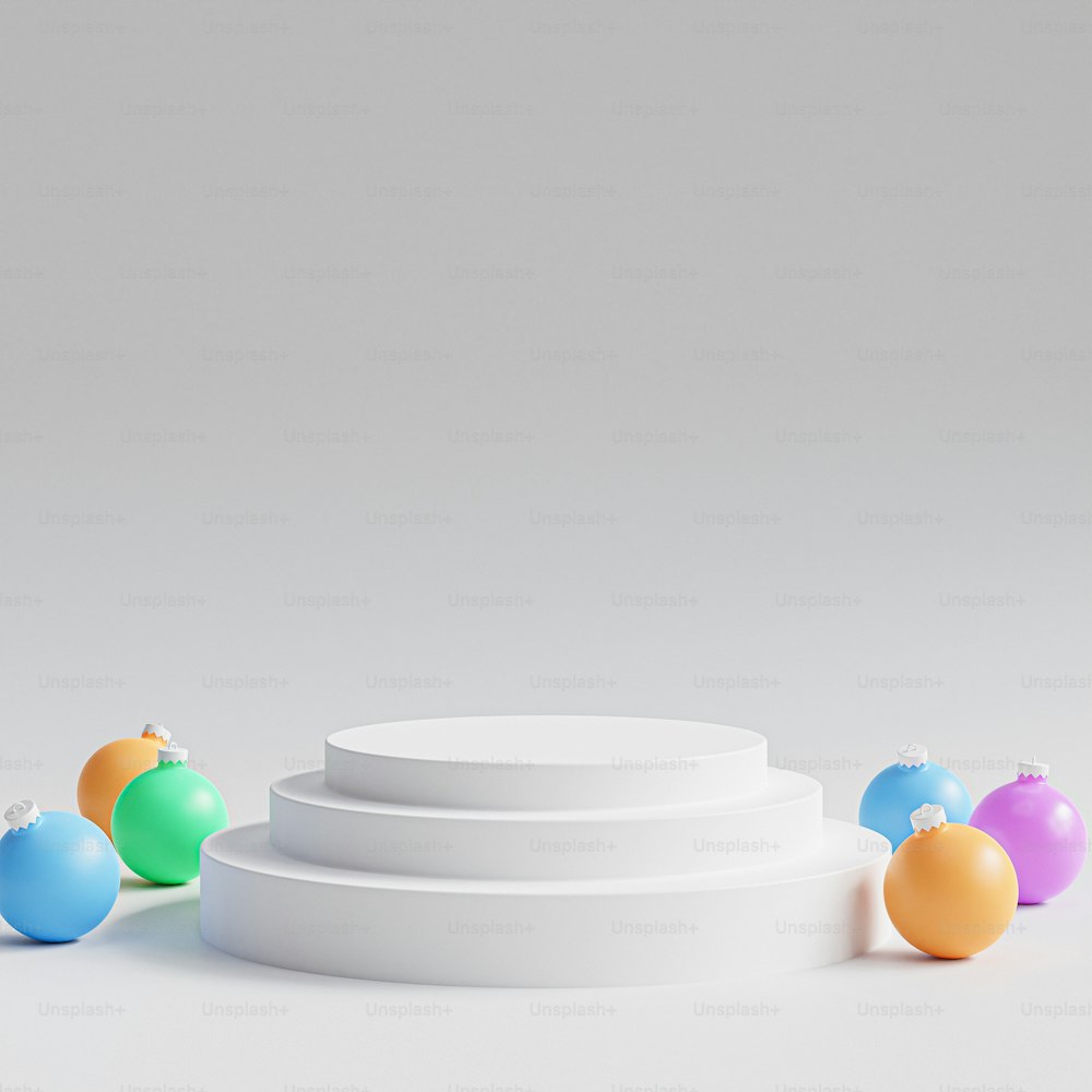 a group of colorful ornaments sitting on top of a white table