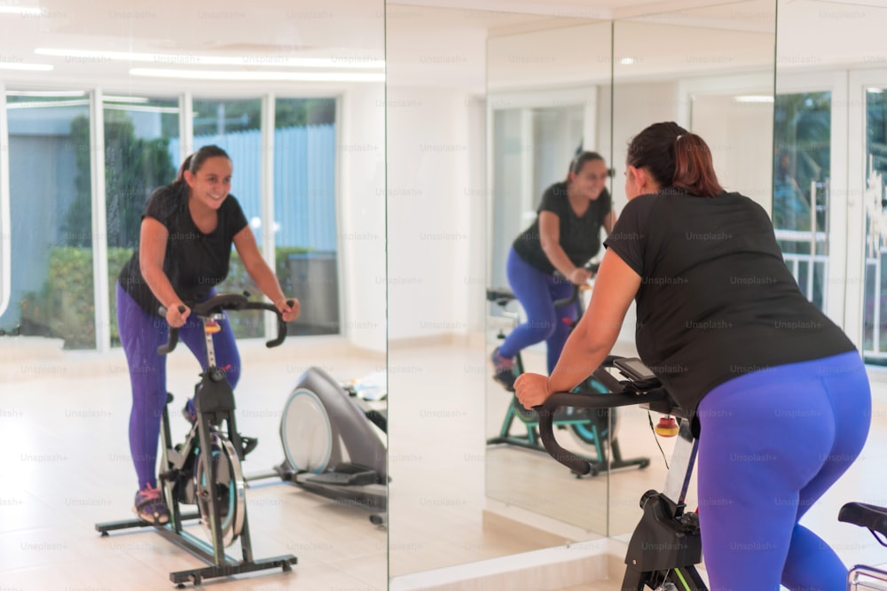 Woman in exercising class in gym