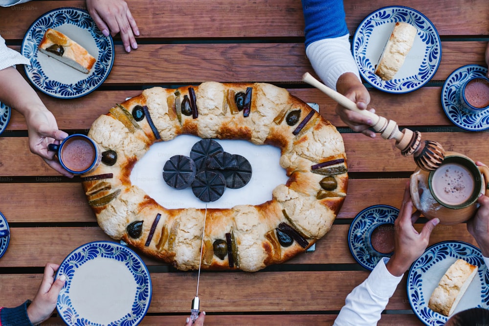 Rosca de reyes or Epiphany cake, Roscon de reyes with traditional mexican chocolate cup