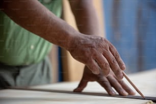close-up of carpenter hands working