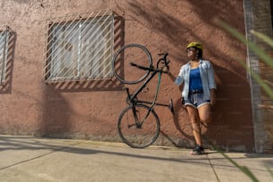 portrait of a mexican woman, urban cyclist, international bicycle day