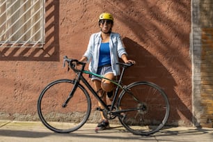 portrait of a mexican urban cyclist looking at camera
