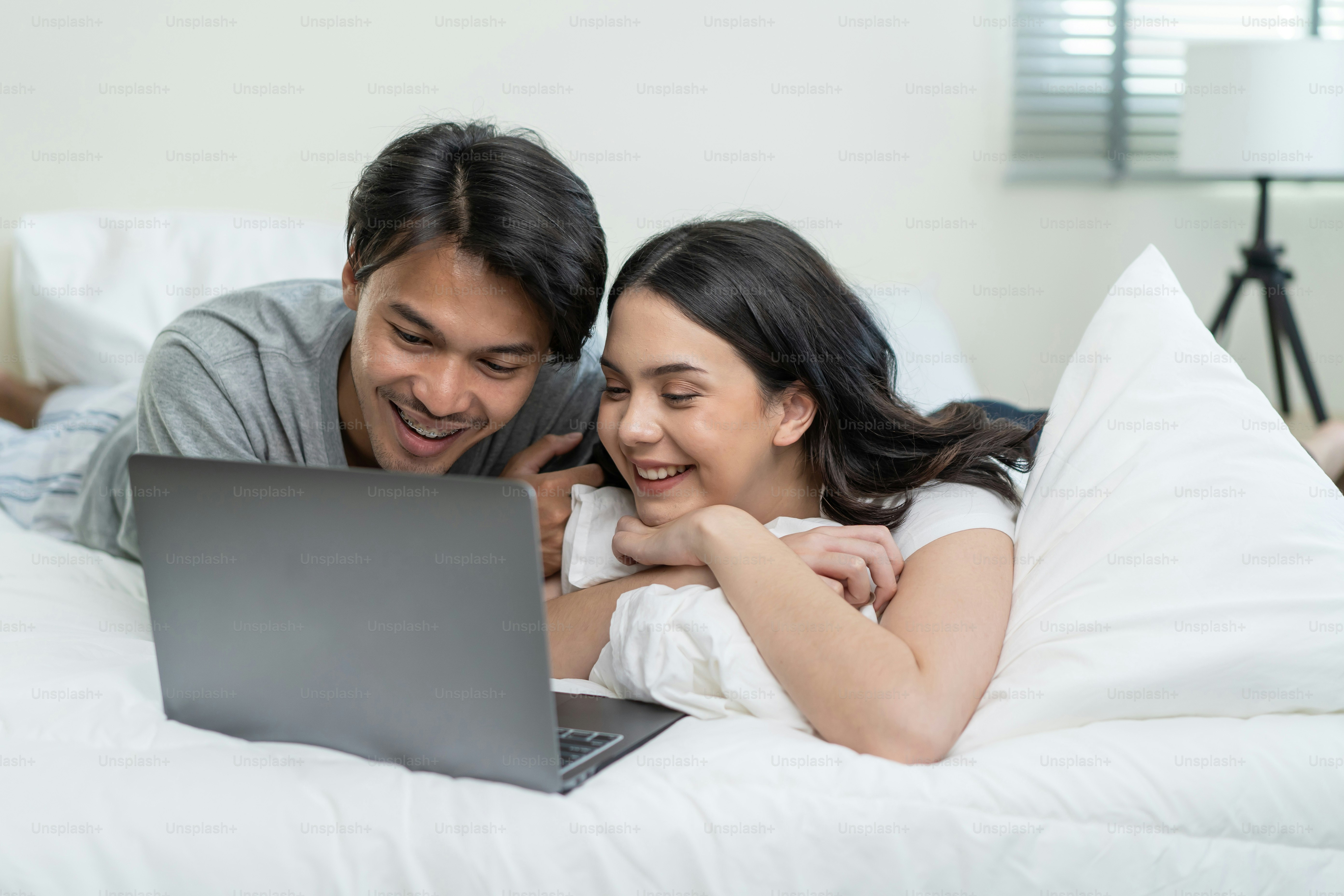 Couple reviewing online nikah legal documents before virtual marriage session