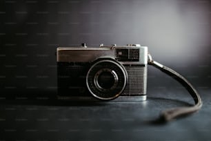 a black and white photo of a camera