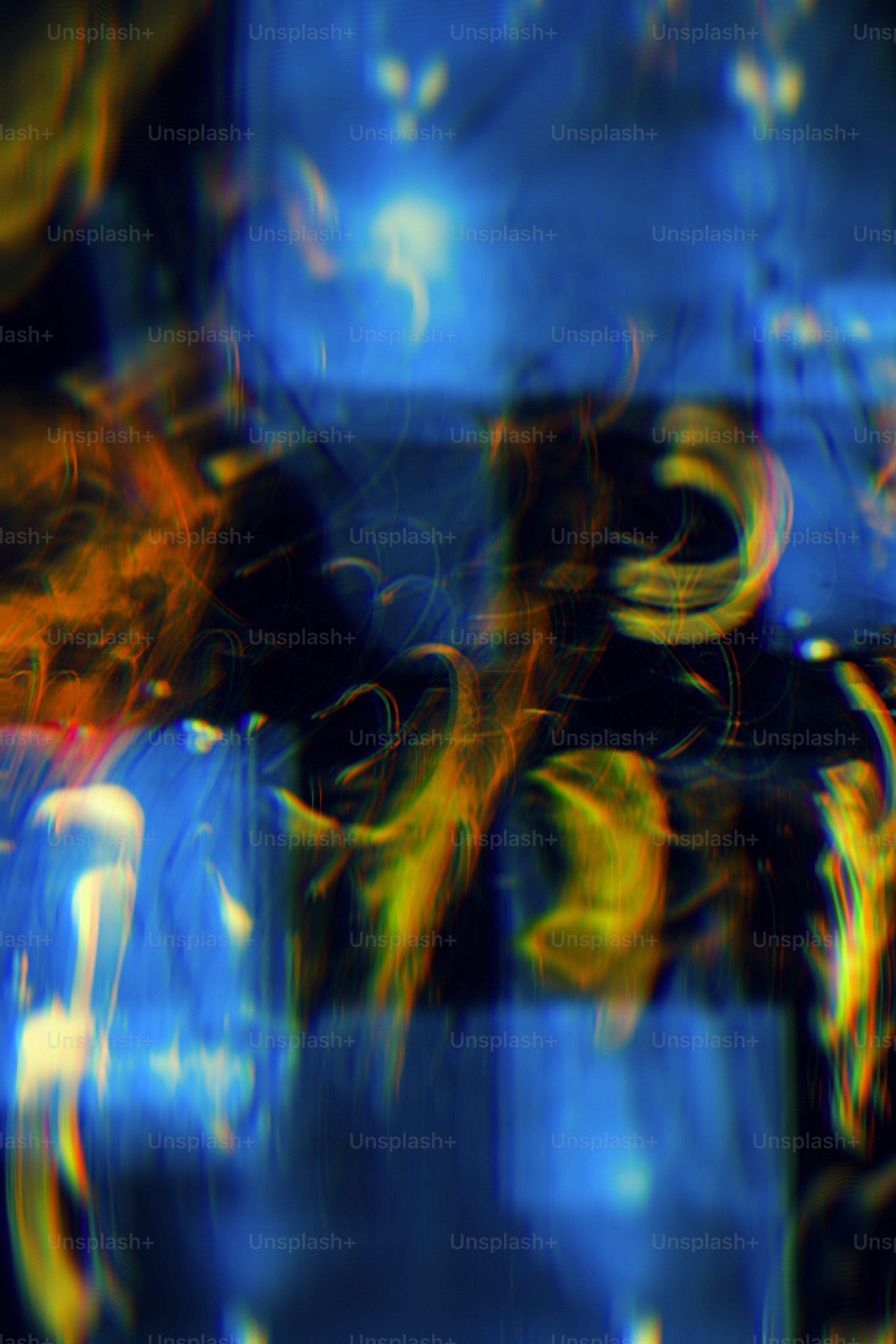 a blurry image of a blue and yellow box