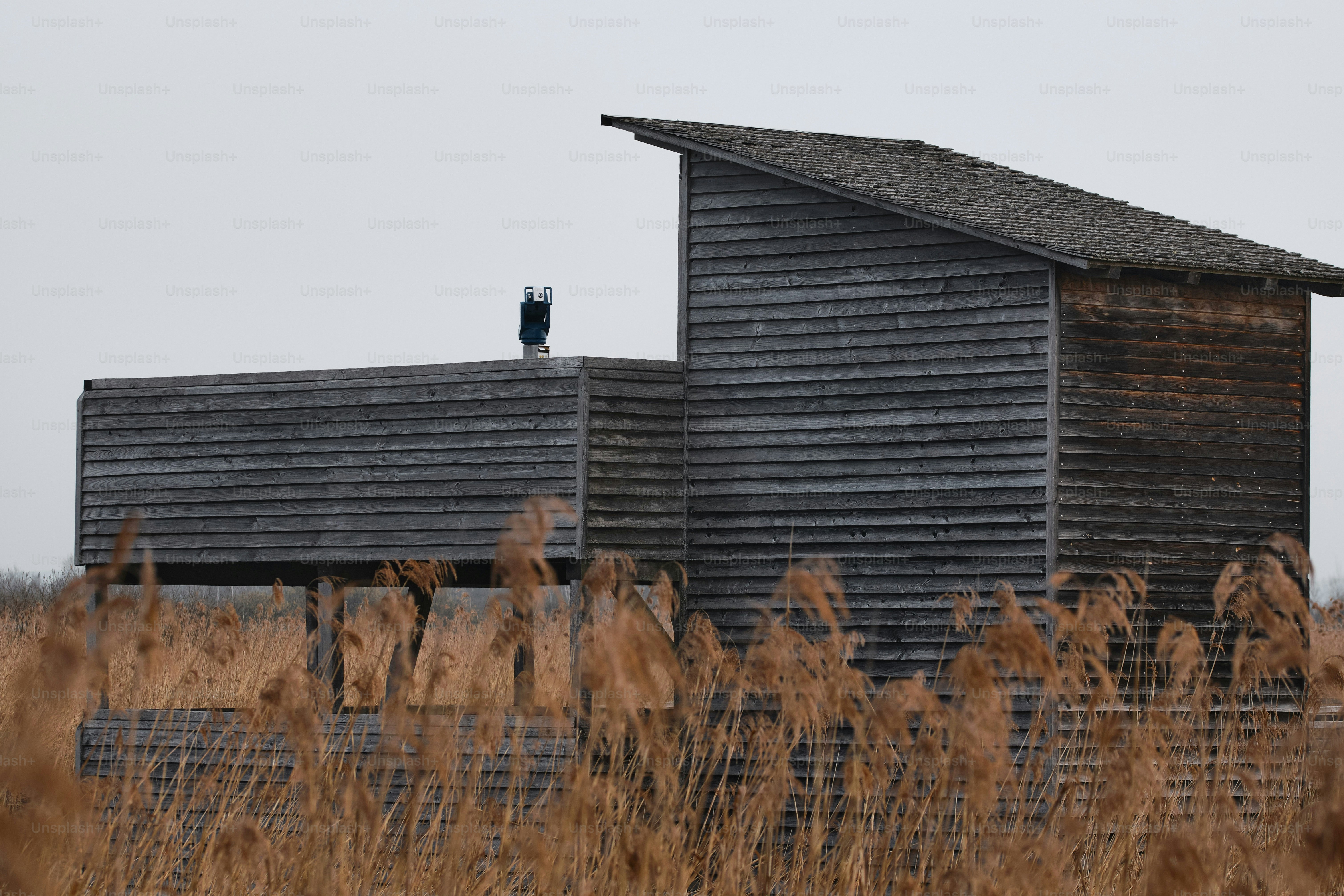 a couple of wooden buildings sitting next to each other