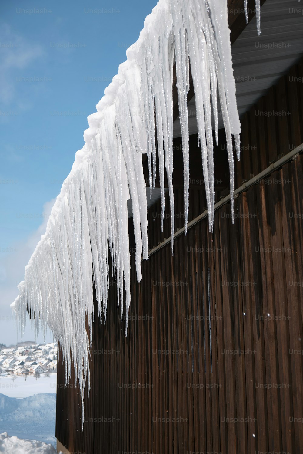 icicles hanging from the roof of a building