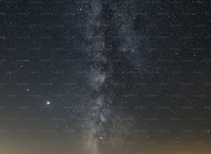 the night sky with stars and the milky
