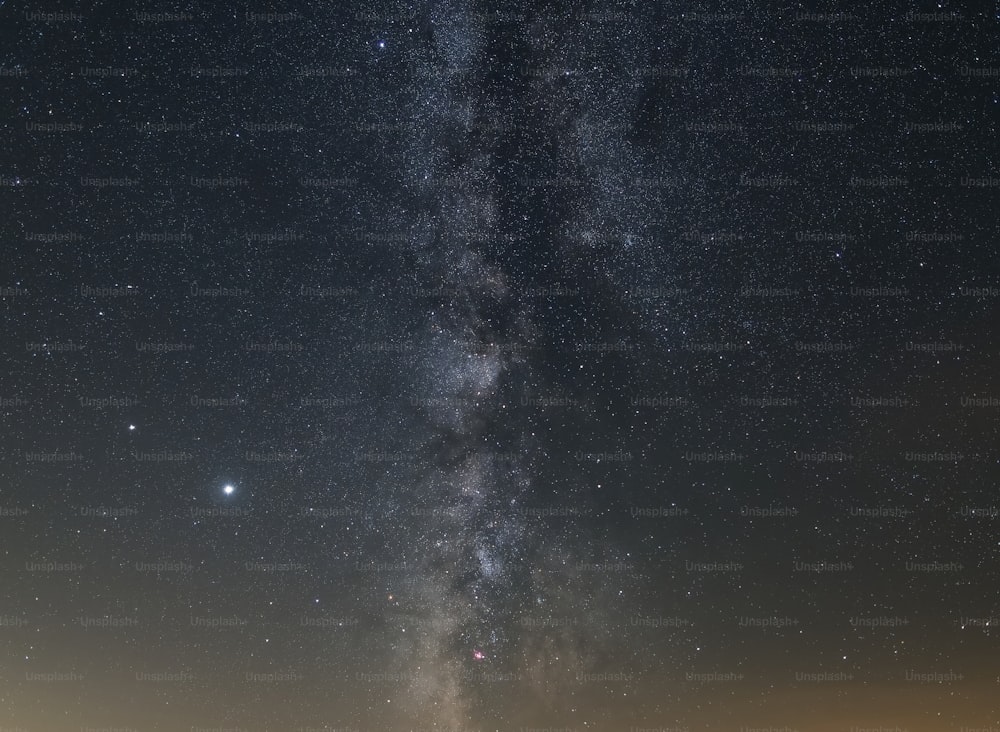 the night sky with stars and the milky