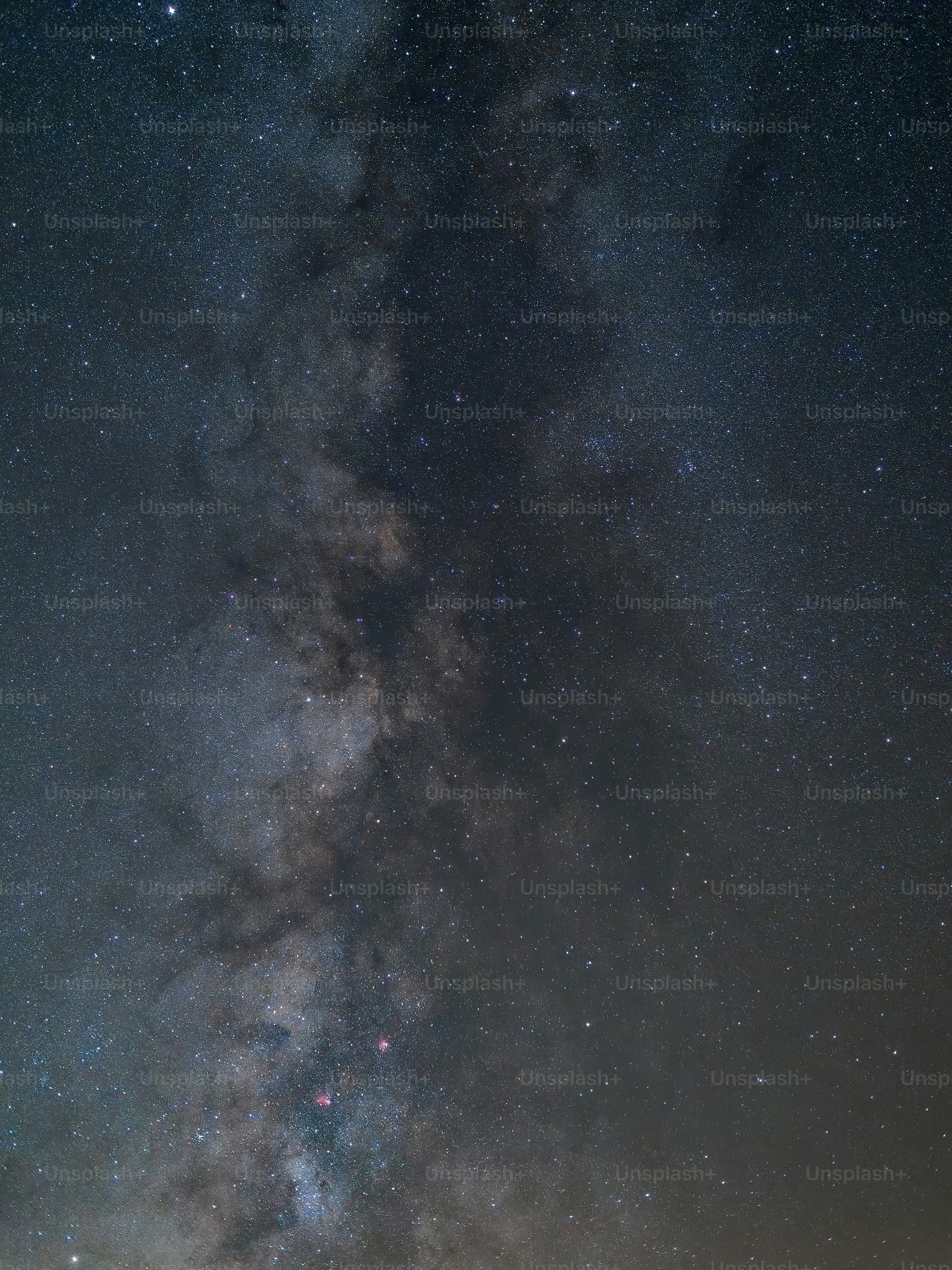 the night sky is filled with stars and clouds