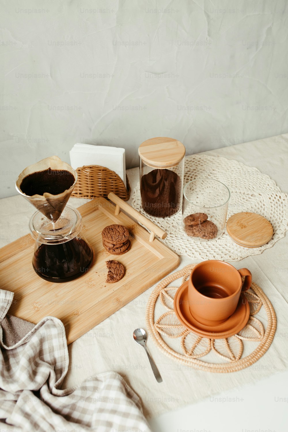 a wooden tray topped with a cup of coffee