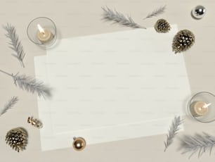 クリスマスの飾りに囲まれた白い紙