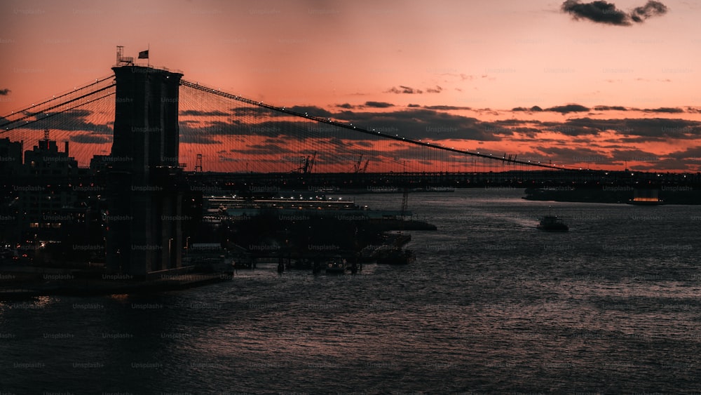 a large bridge spanning over a large body of water