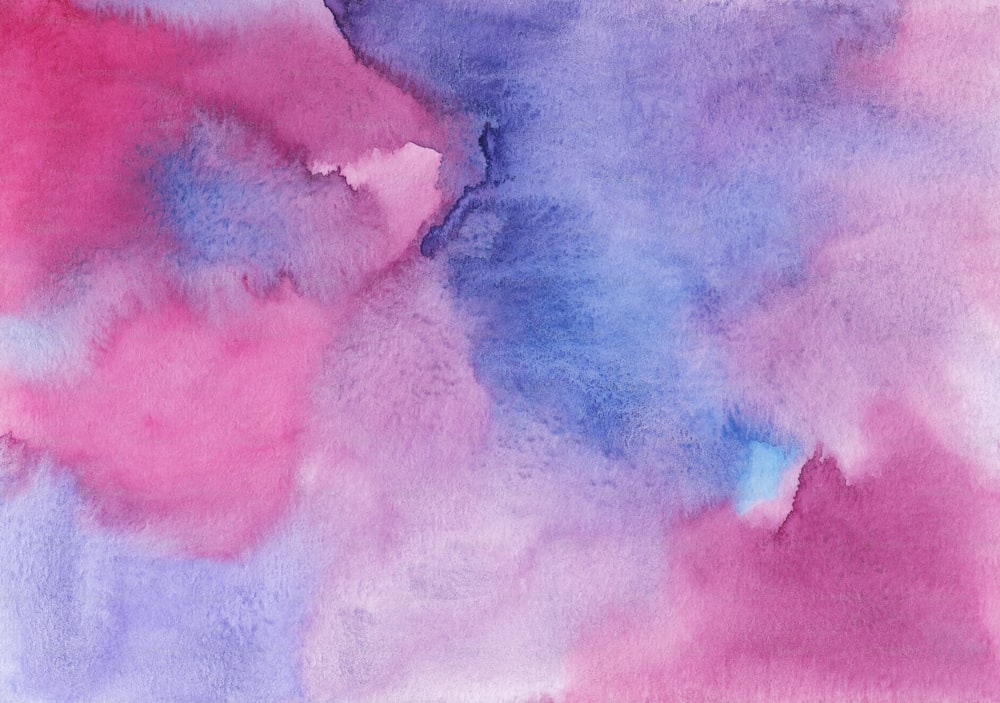 a watercolor painting of pink, blue, and purple