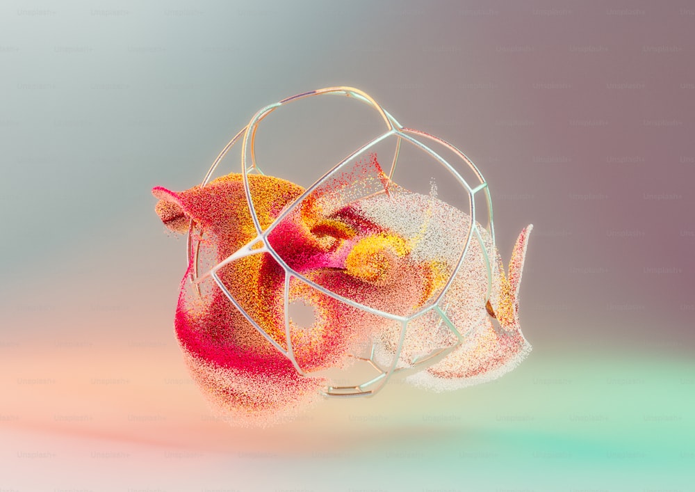 a glass vase with a red and yellow flower inside of it