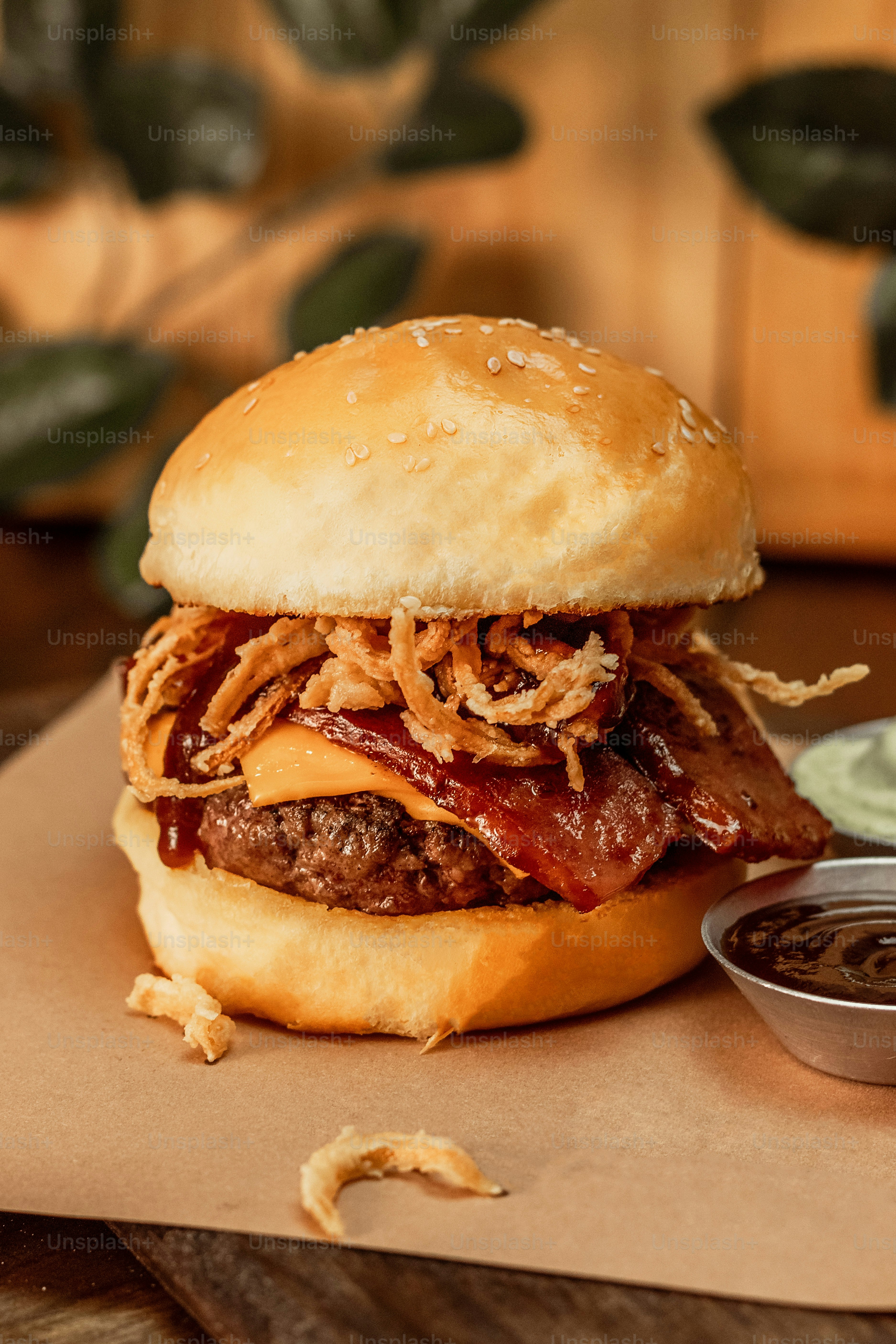 a pulled pork sandwich with a side of ranch dressing