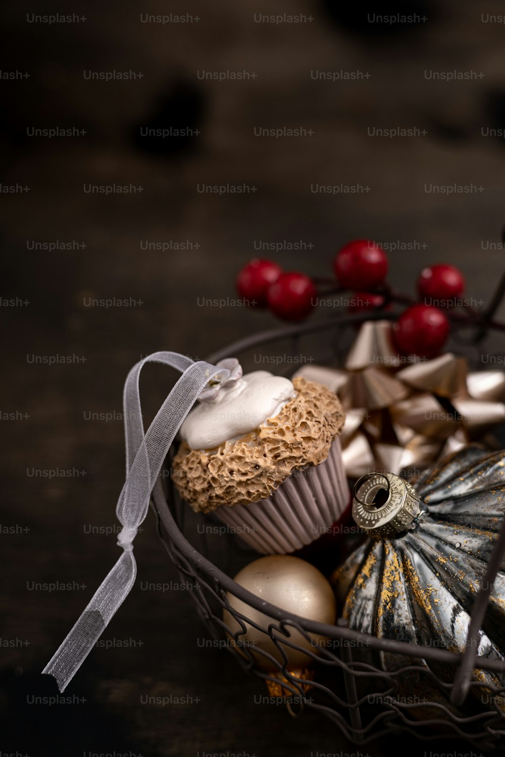 a basket filled with cupcakes on top of a table