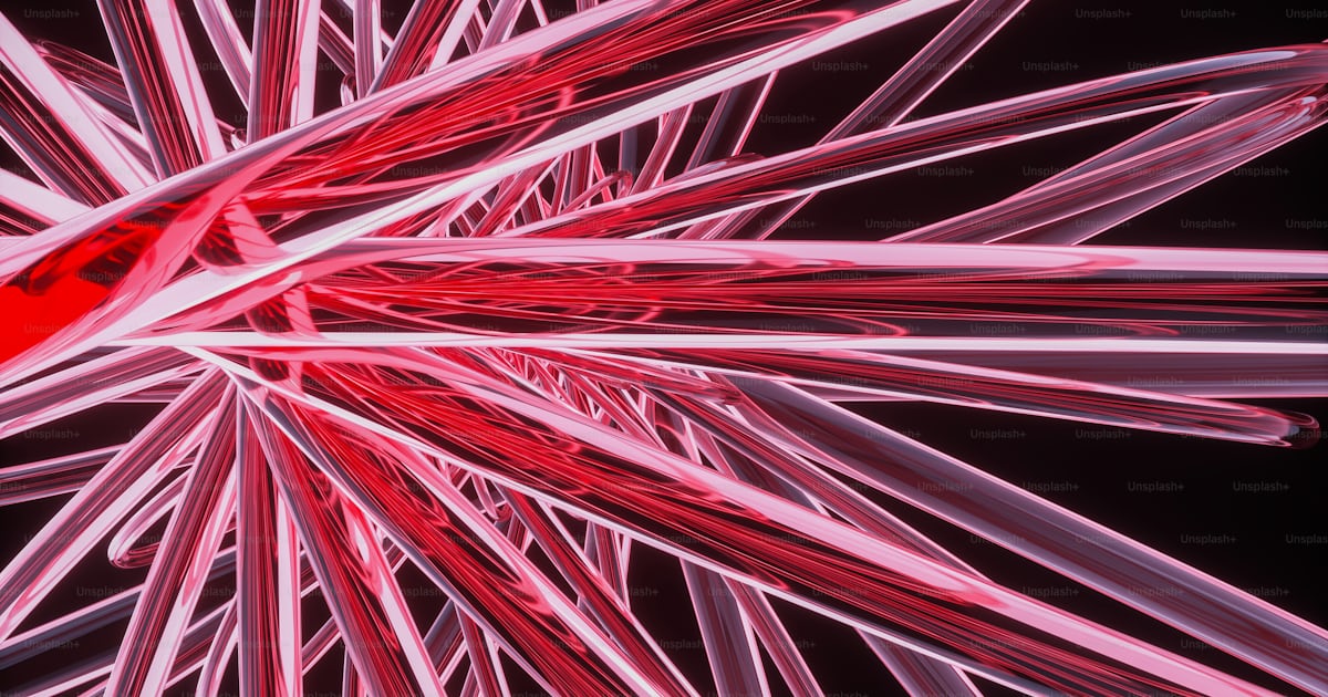 Gros plan d’un objet rouge et blanc sur fond noir photo – Fond d’écran ...