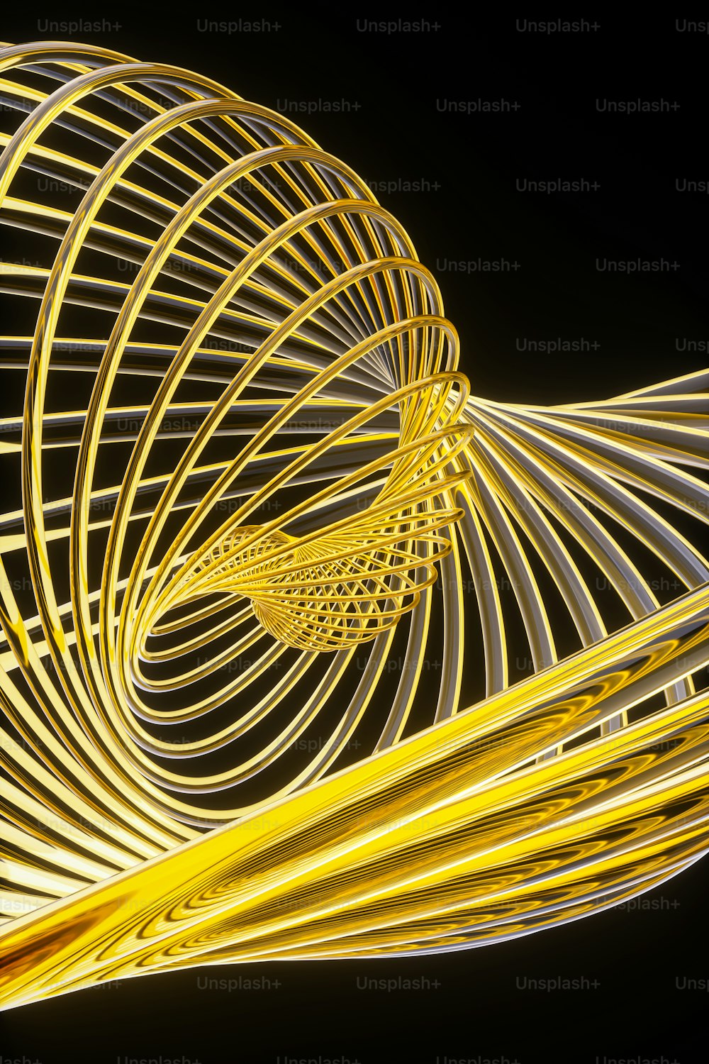a spiral of yellow wire on a black background