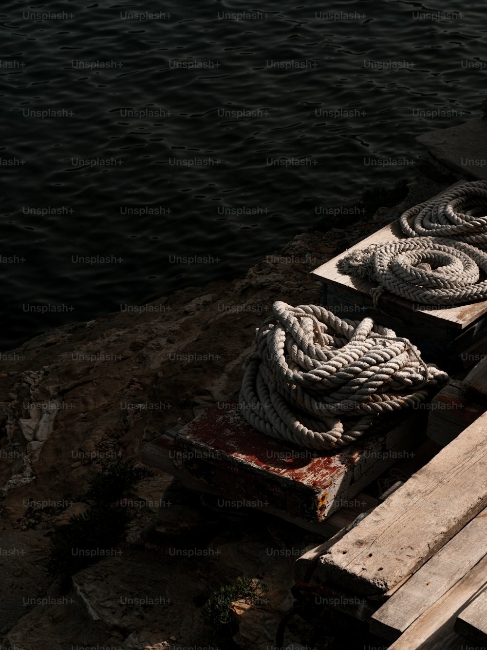 a boat with ropes tied to the side of it