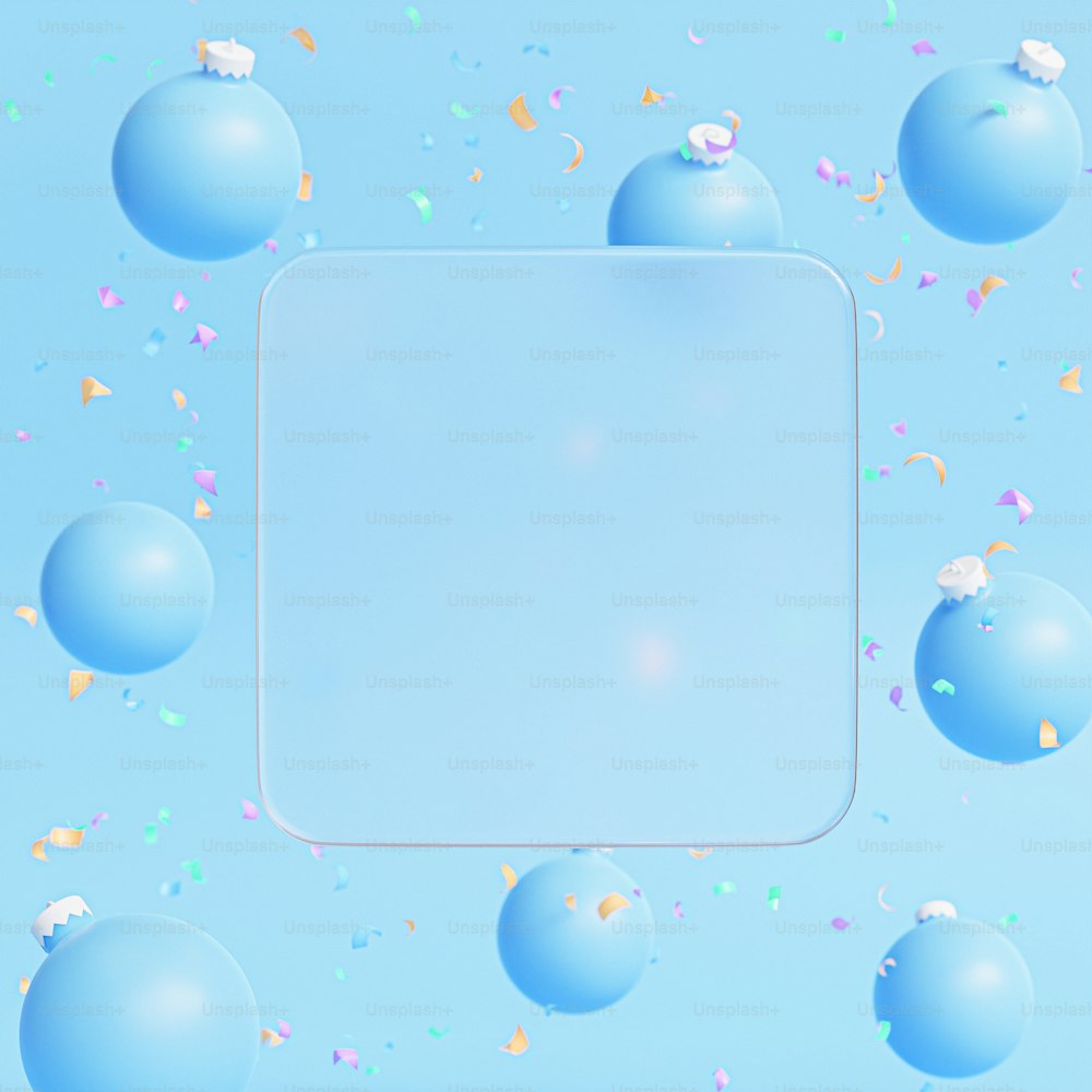 a white square frame surrounded by blue balls and confetti