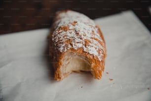 a close up of a pastry on a napkin