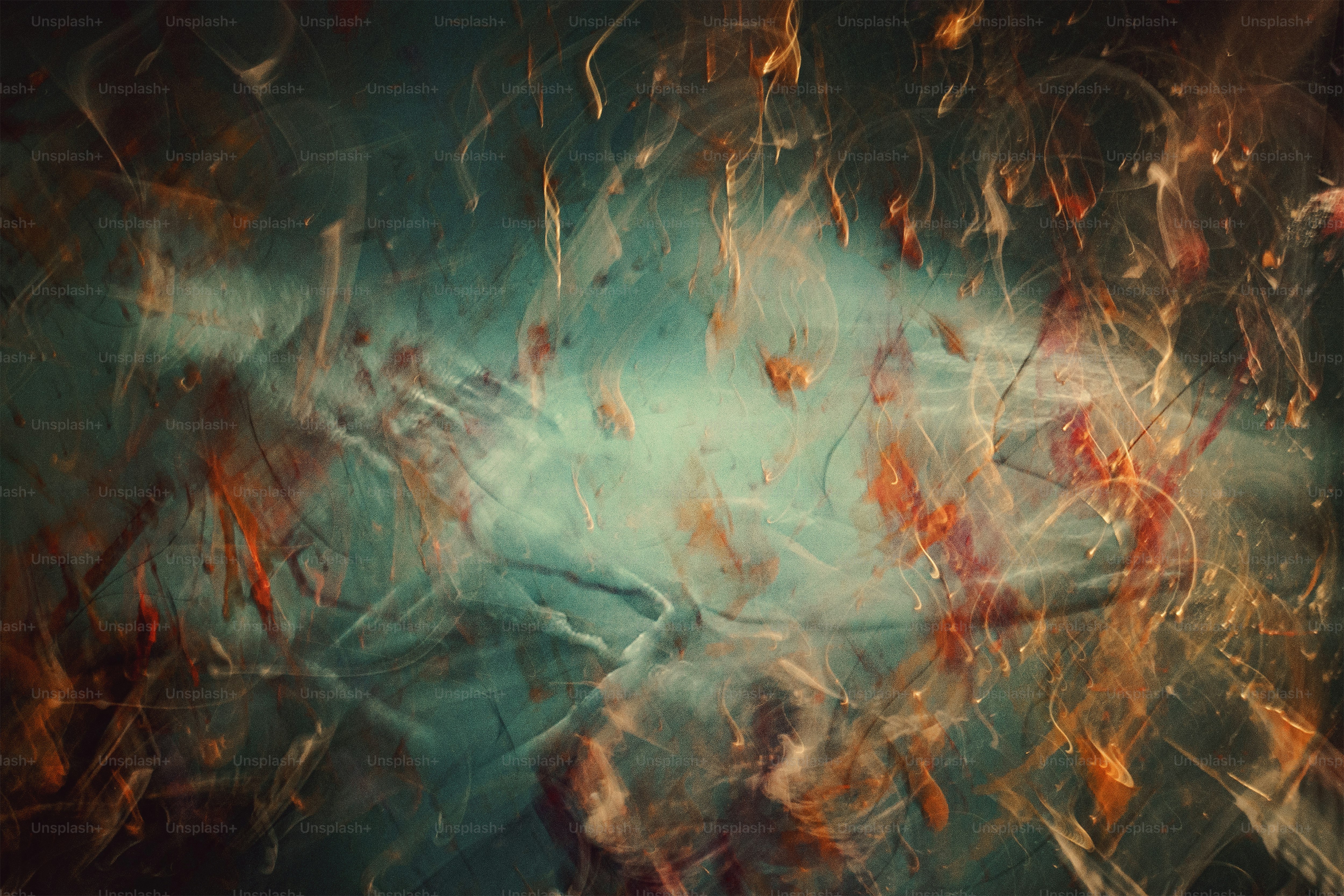 an abstract painting of red, orange, and blue colors
