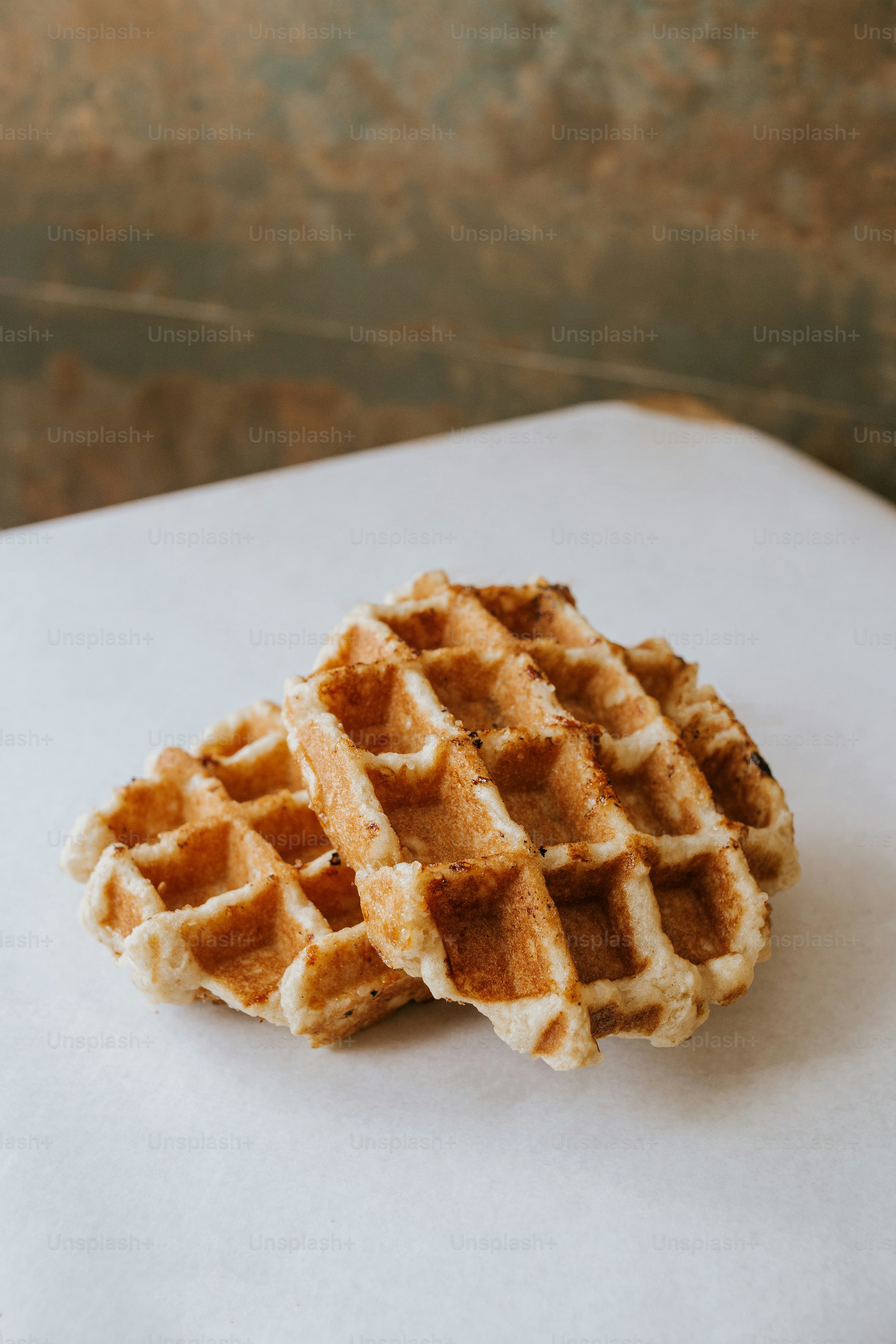 a waffle sitting on top of a piece of paper