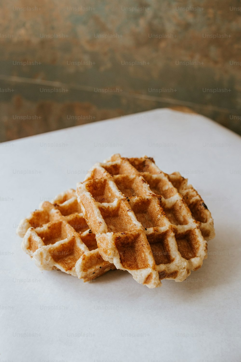 a waffle sitting on top of a piece of paper