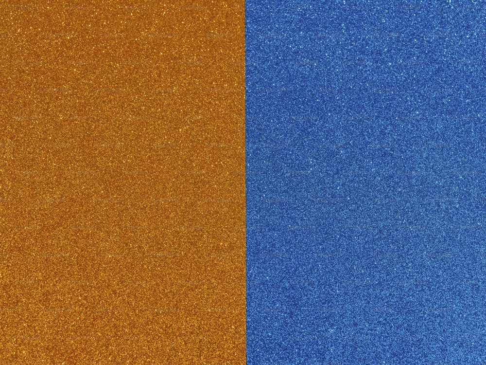 a close up of a blue and orange background