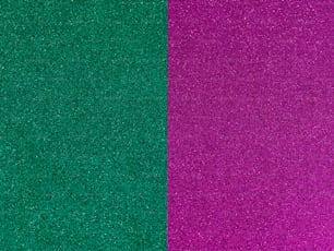 a green and purple background with a black border