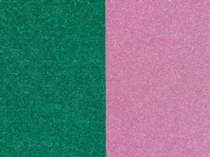 a pink and green background with a black border