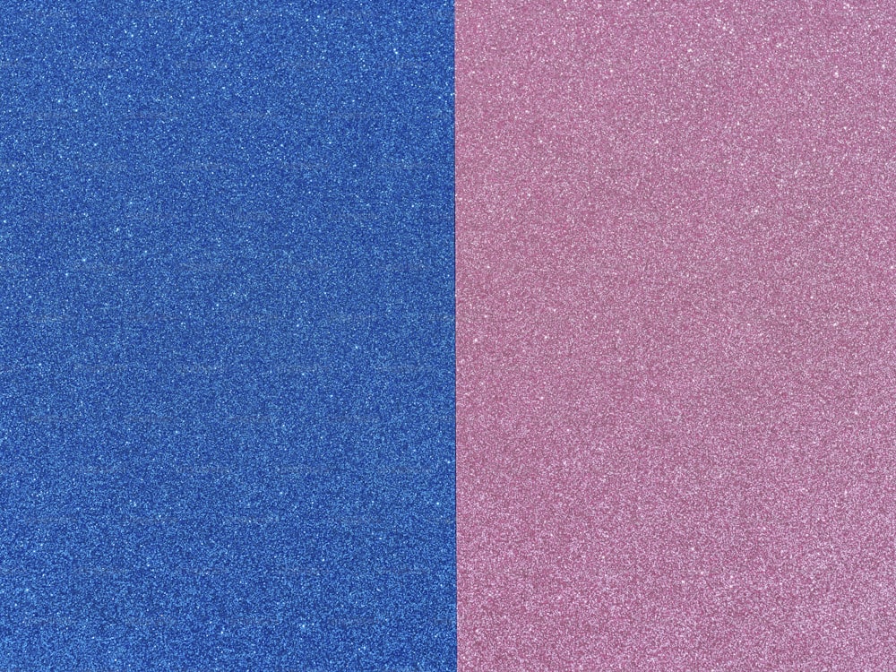 a blue and pink background with glitter