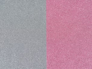a pair of gray and pink glittered paper
