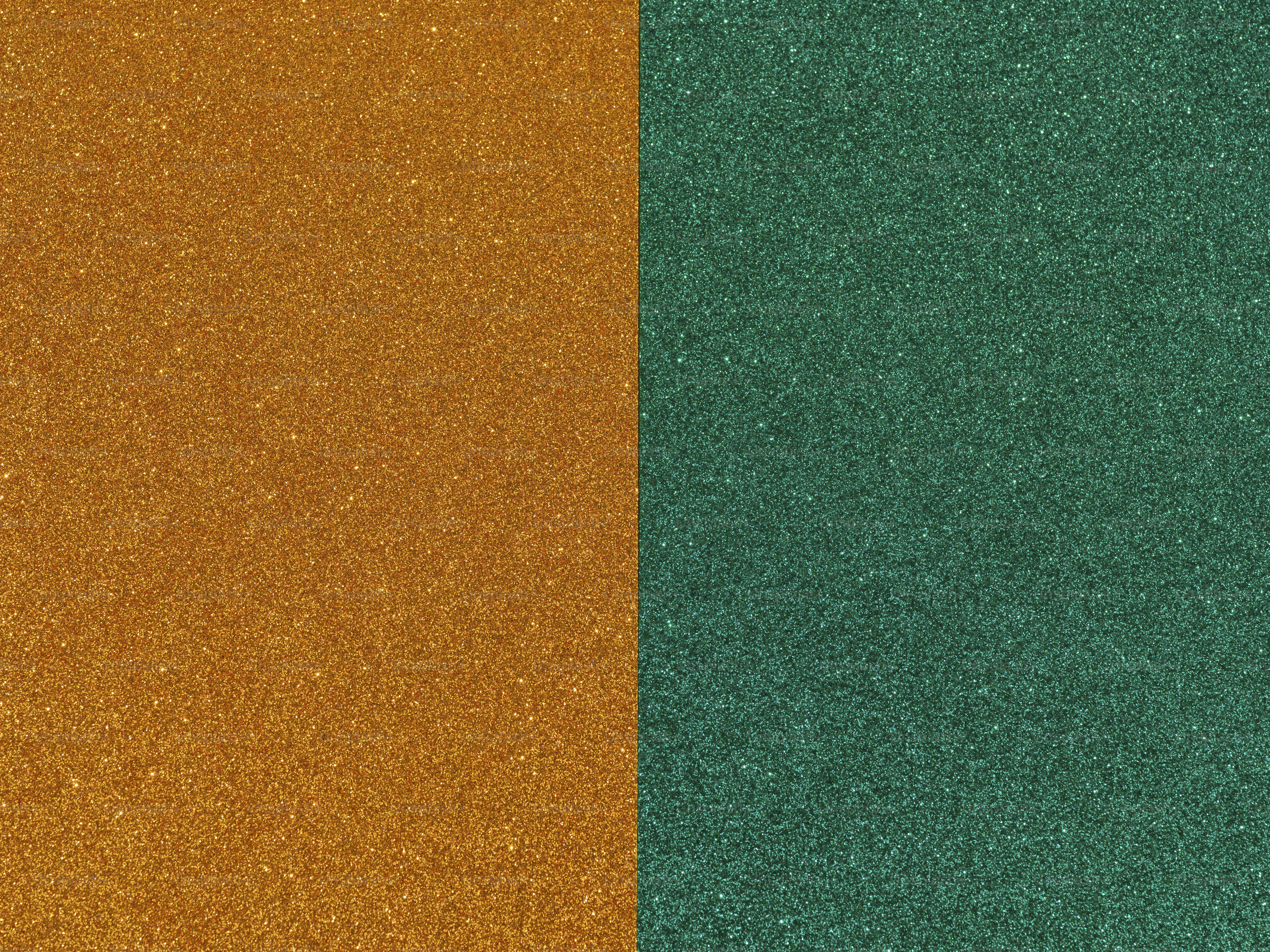 a close up of a green and orange background