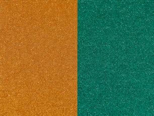 Eine Nahaufnahme eines grünen und orangefarbenen Hintergrunds
