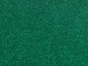 a close up view of a green surface